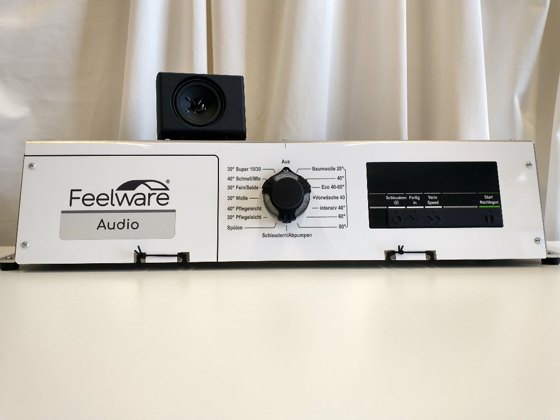 DualDemokit für Waschmaschinen mit 1 Feelware Audio Waschmaschinenknopf und einer taktilen Schablone für das Waschmaschinendisplay, sowie einer AudioBox.